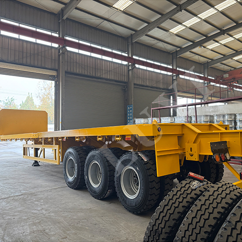 Three axle flat semi-trailer CONTAINER TRANSPORTATION EQUIPMENT AND VARIOUS MACHINERY AND EQUIPMENT